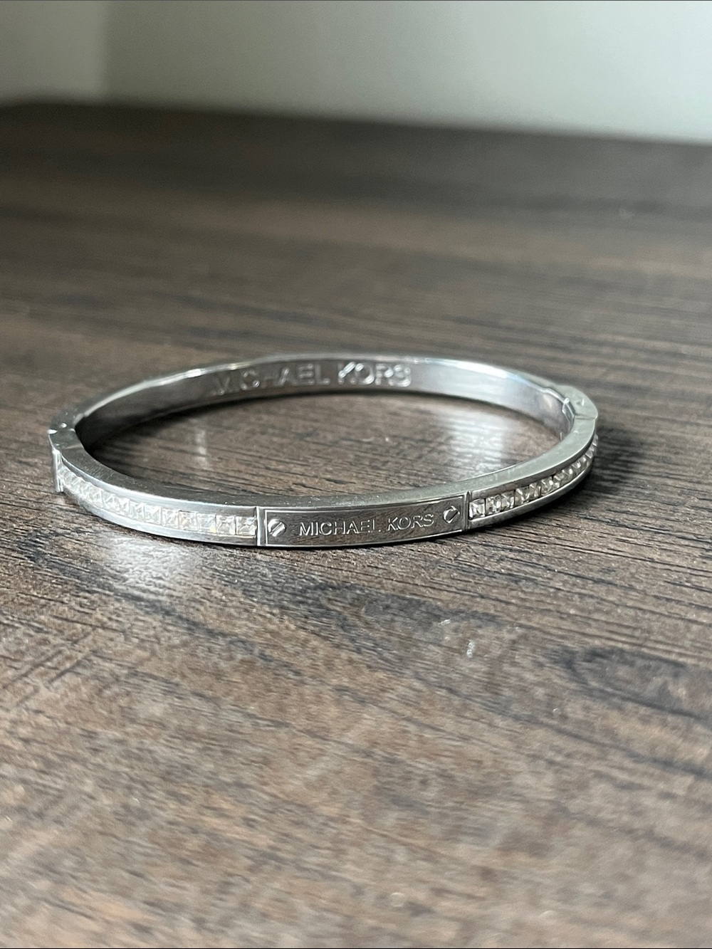 Michael Kors Bracelet with hinge closure.